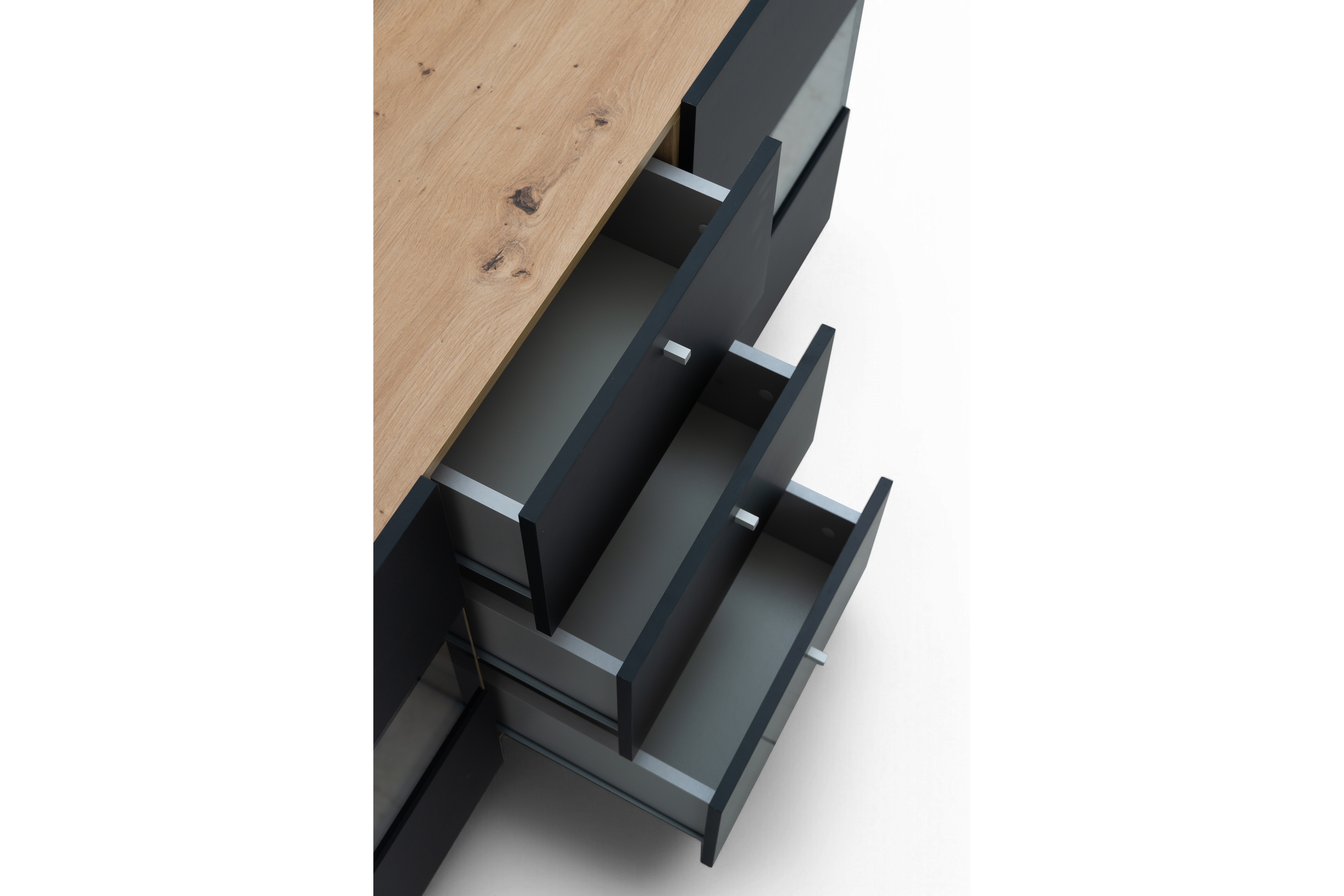 Komoda Baros 26 132 cm so zásuvkami - dub artisan / čierny mat Komoda so zásuvkami Baros 26 - 132 cm - Dub artisan / Čierny mat