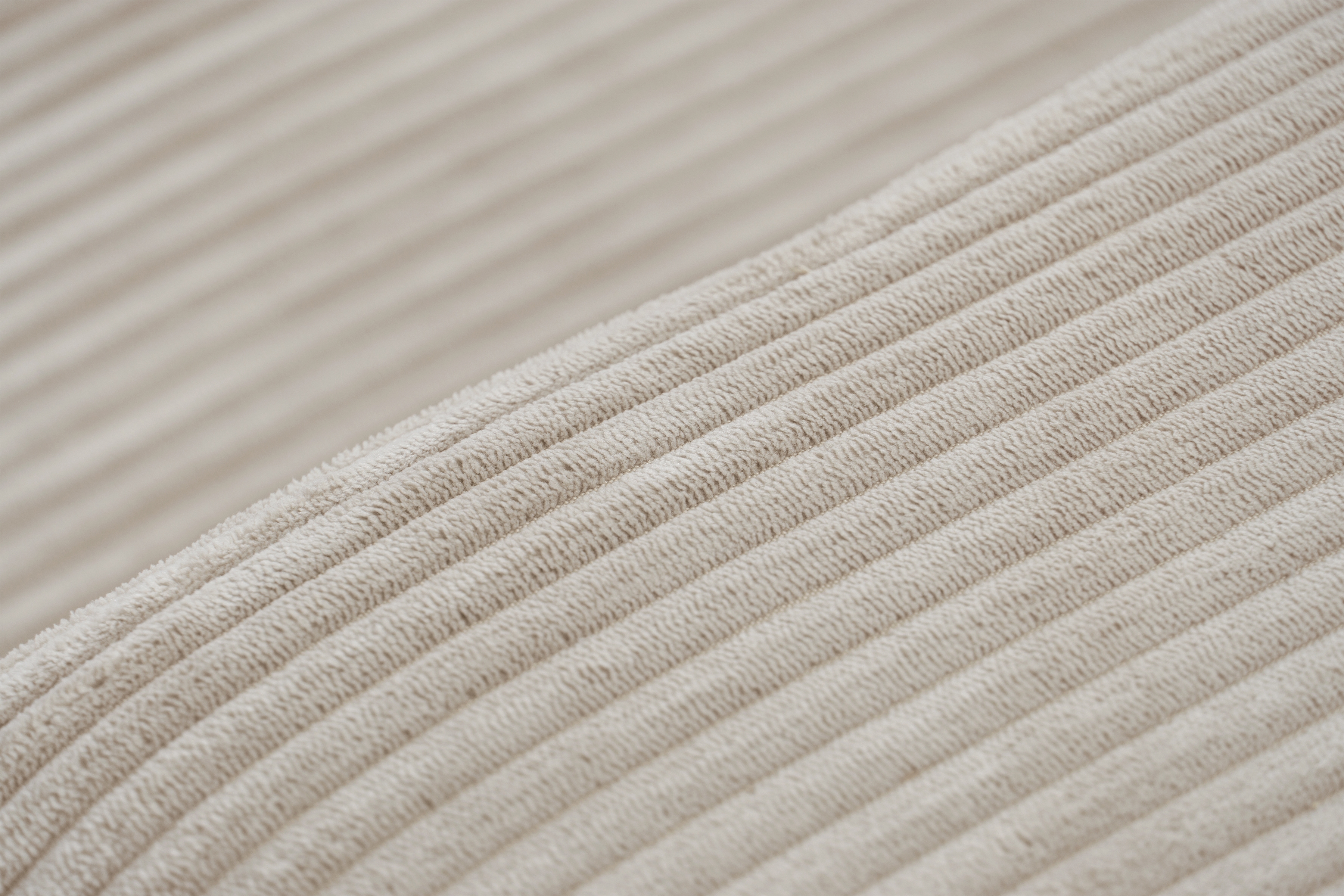 Rozkladacia rohová sedacia súprava Avia Mini univerzálna - béžový menčester Anafi 22 Rohová sedacia súprava Avia Mini s funkciou spánku uniwersalny prawo/Ľavá strana - béžový MENČESTER Anafi 22 