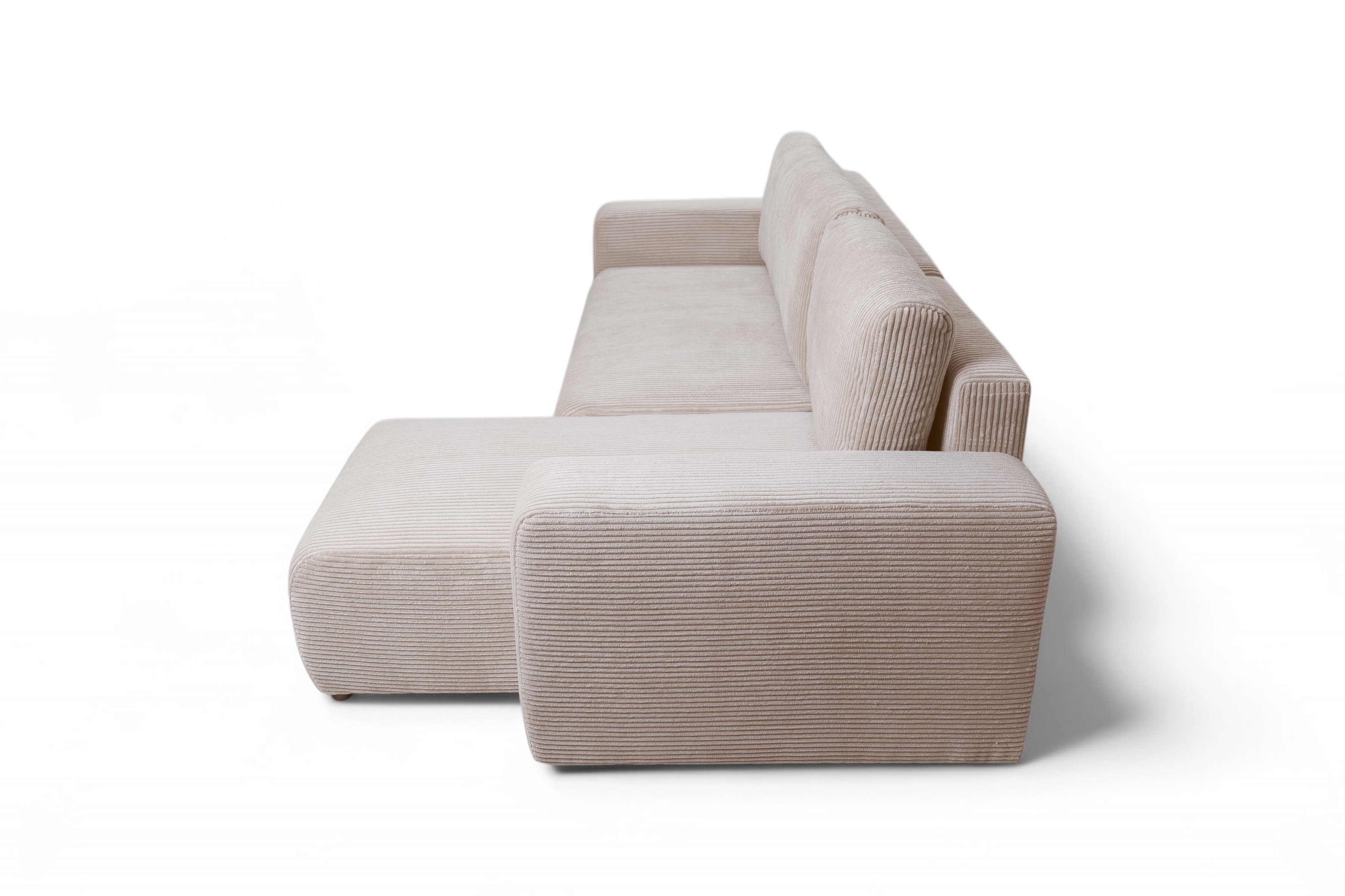 Rozkladacia rohová sedacia súprava Avia Mini univerzálna - béžový menčester Anafi 22 Rohová sedacia súprava Avia Mini s funkciou spánku uniwersalny prawo/Ľavá strana - béžový MENČESTER Anafi 22 