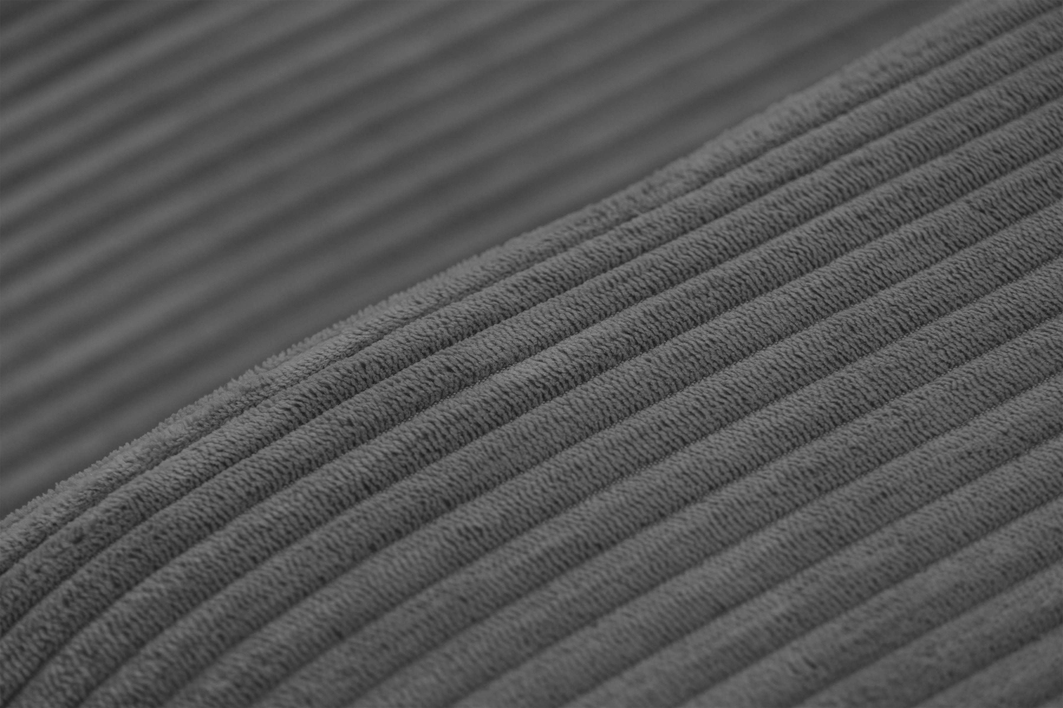 Rozkladacia rohová sedacia súprava Avia Mini univerzálna - grafitový menčester Lincoln 90 Rohová sedacia súprava Avia Mini s funkciou spánku uniwersalny prawo/Ľavá strana - Grafitový MENČESTER Lincoln 90