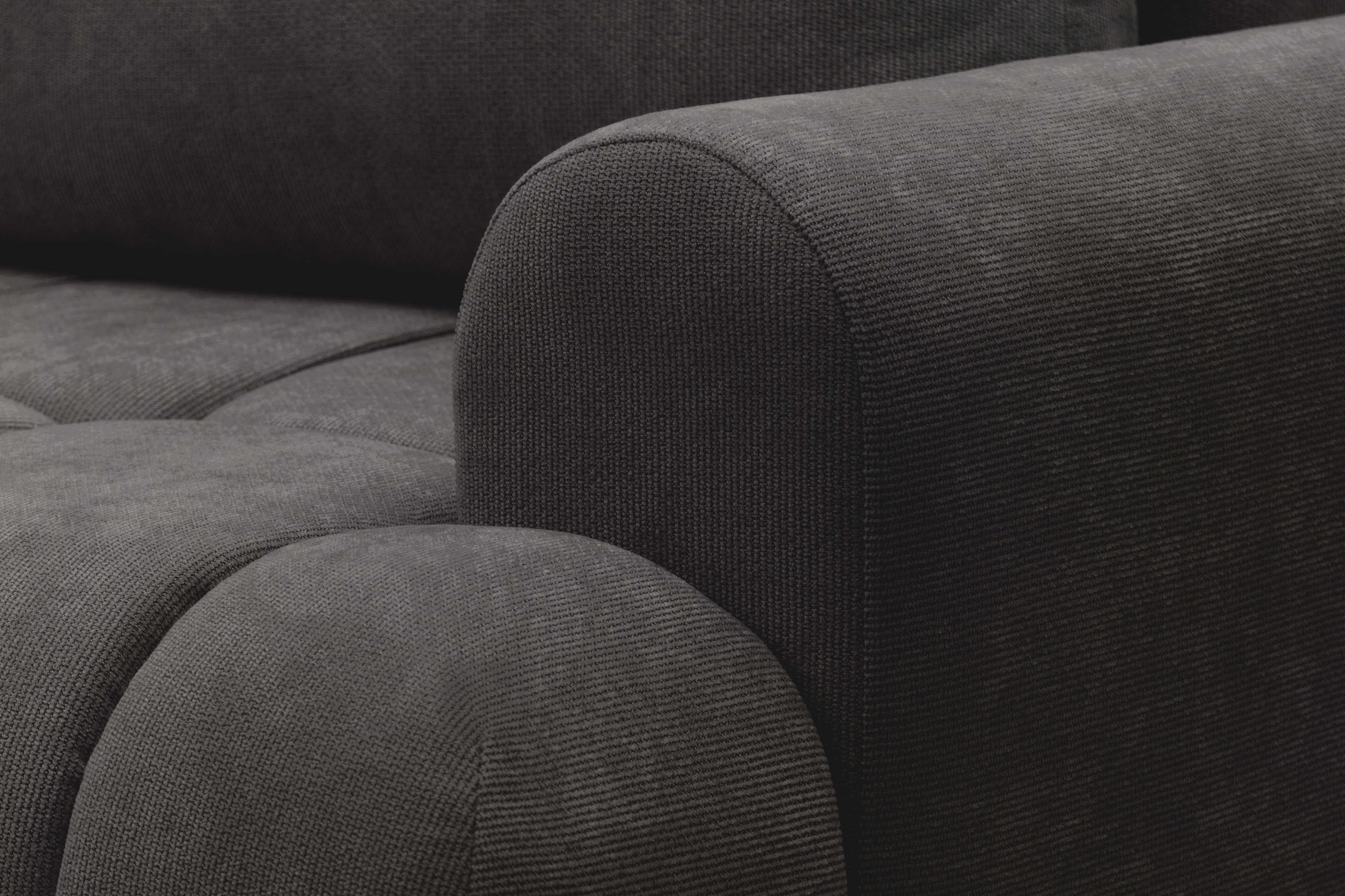 Rohová sedacia súprava Lutario L ľavá s funkciou spania - tmavosivá hydrofóbna pletená látka Venice 2021 Rohová sedacia súprava Lutario L s funkciou spánku Ľavá strana - ciemnoszara plecionka hydrofobowa Venice 2021