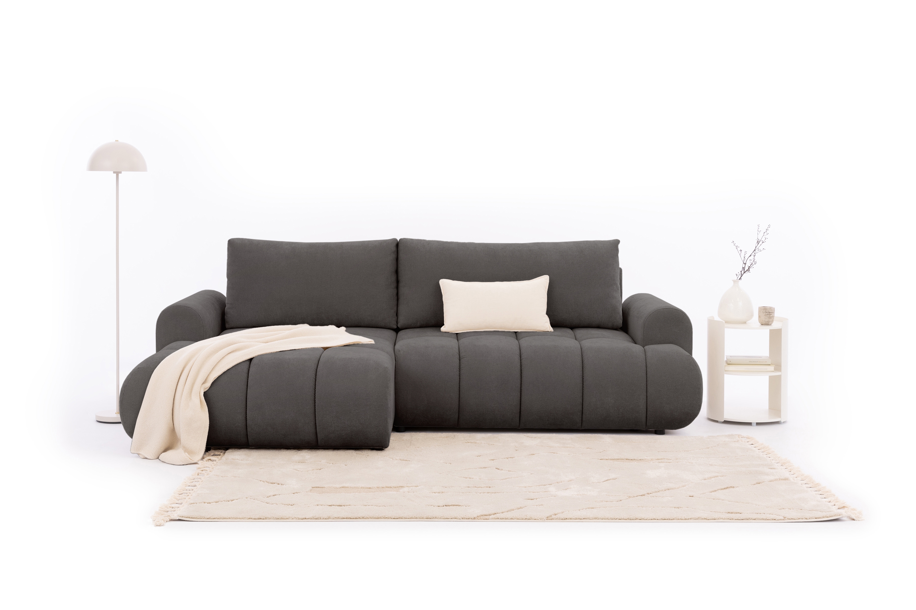 Rozkládací rohová sedací souprava Lutario Mini levá - tmavě šedá Venice 2021 Rohová sedací souprava Lutario Mini rozkládací levá - ciemnoszara plecionka hydrofobowa Venice 2021