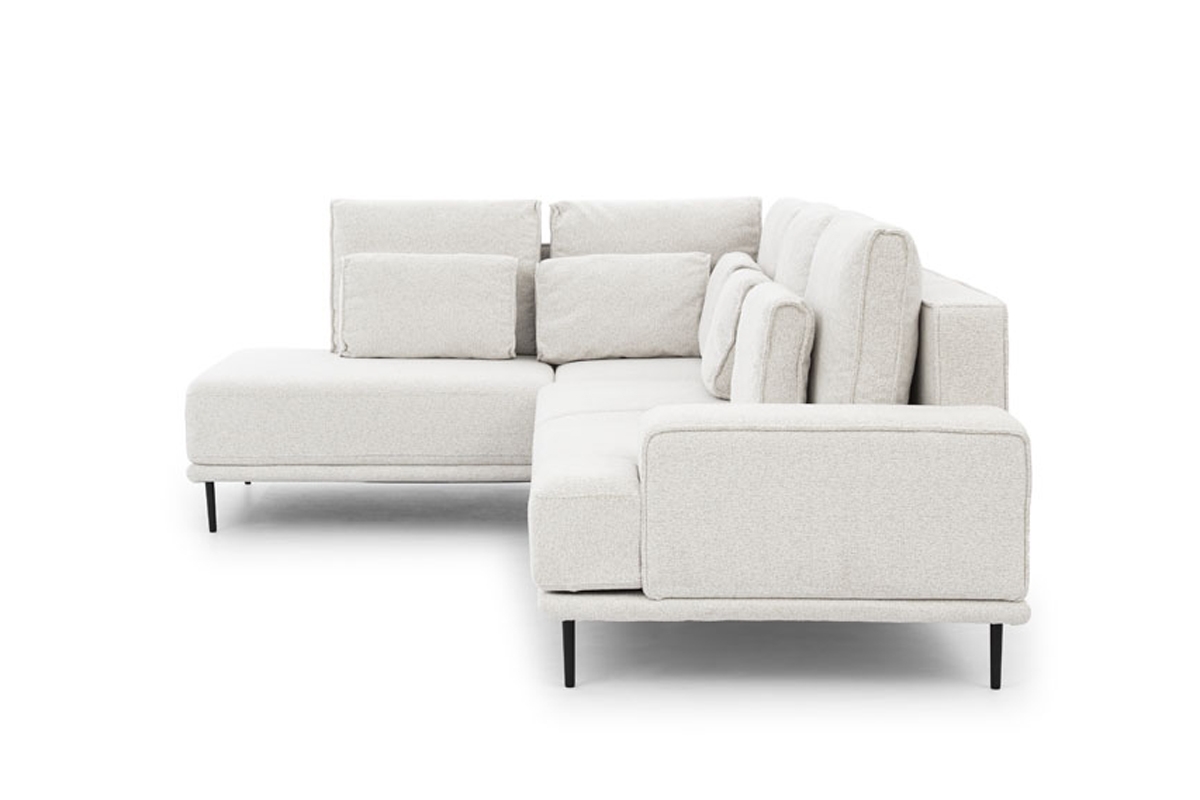 Rozkládací rohová sedací souprava Nicole L jasný Rohová sedací souprava z miekkimi poduszkami 