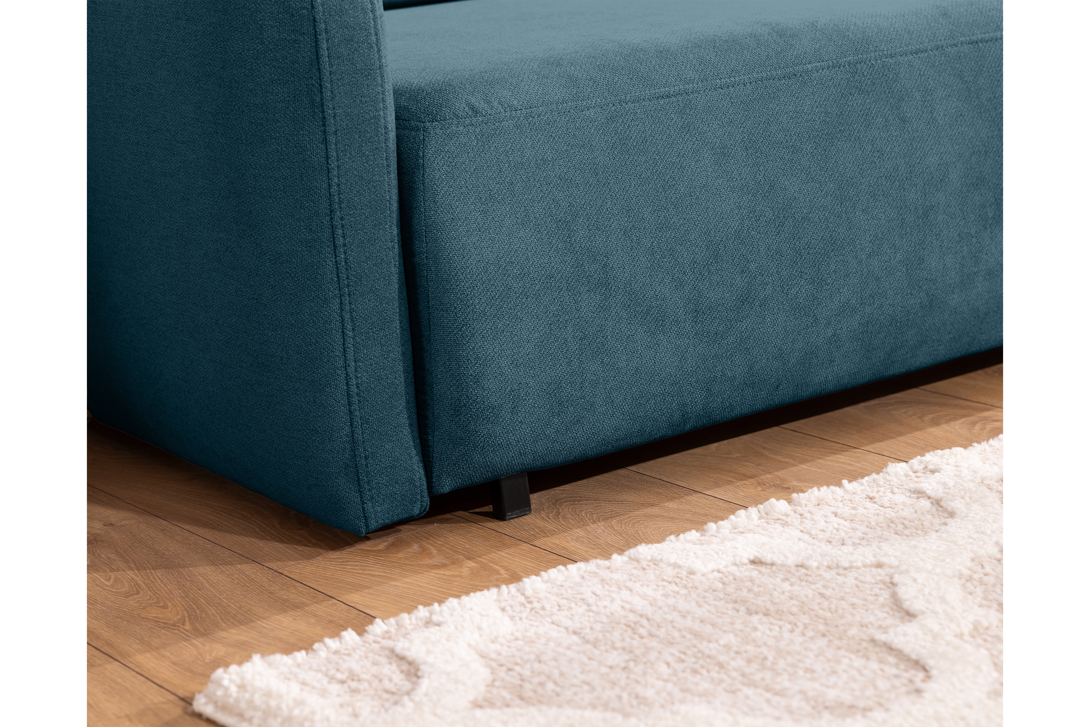 Pohovka Zeldia 105 s funkciou spánku - Modrý šenil hydrofobowy Spring 1117 Pohovka Zeldia 80 s funkciou spania - Modrý šenil hydrofobowy Spring 1110