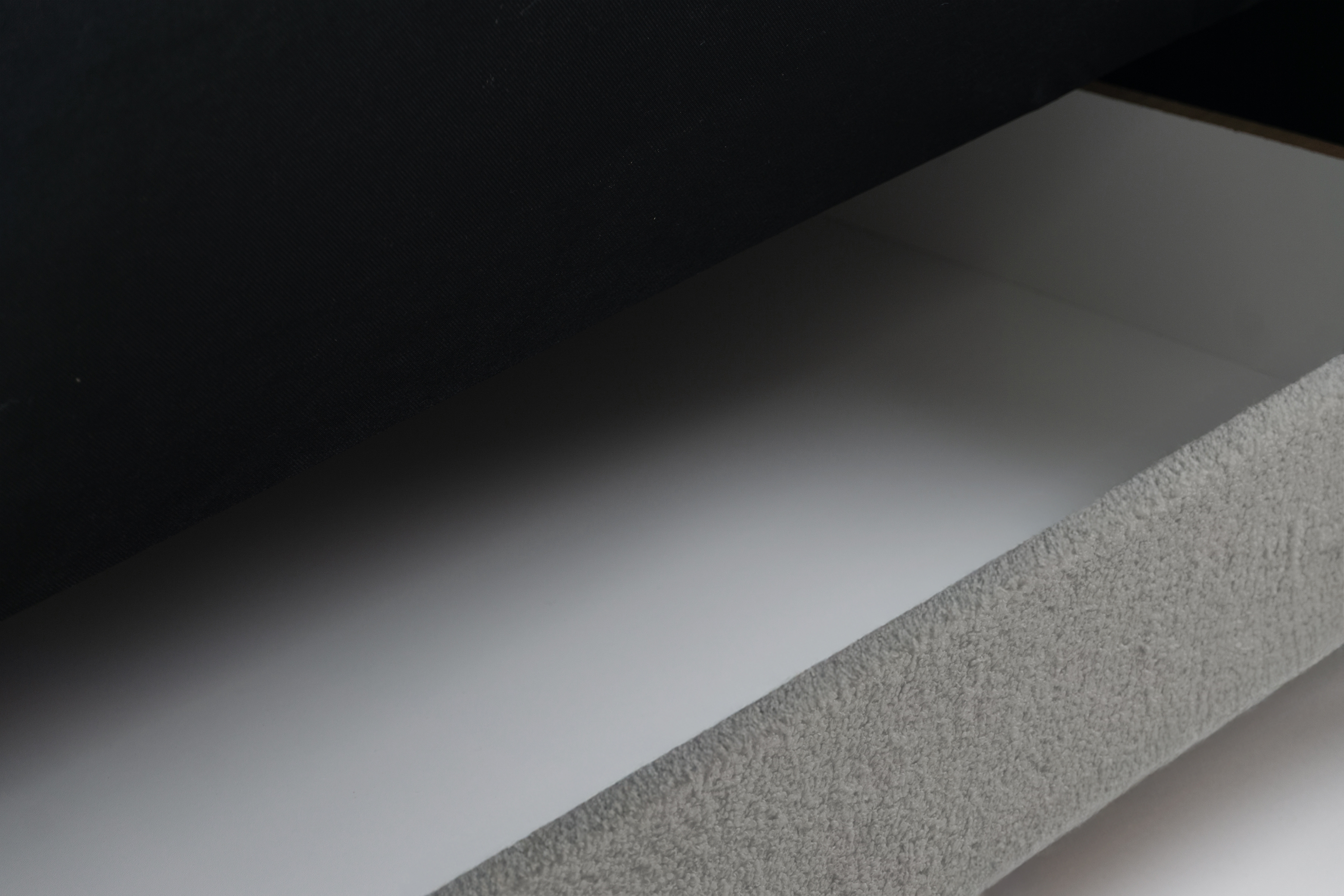 Rozkládací pohovka Linda - šedá Lambi 12 Pohovka Linda rozkladana pro obývacího pokoje - šedá boucle Lambi 12