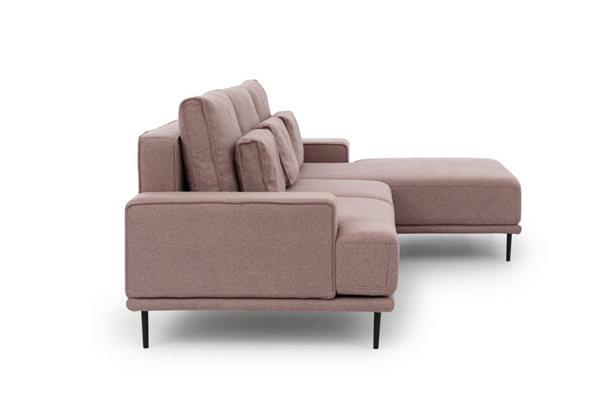 Moderná rohová rozkladacia sedačka do obývačky Nicole Mini Ružová rohová sedacia súprava s vysokými nožičkami