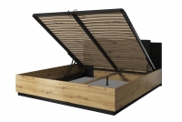Postel Sigma 140x200 s čalouněným čelem a úložným prostorem - artisan / Černý supermat postel s vnitřním úložným prostorem