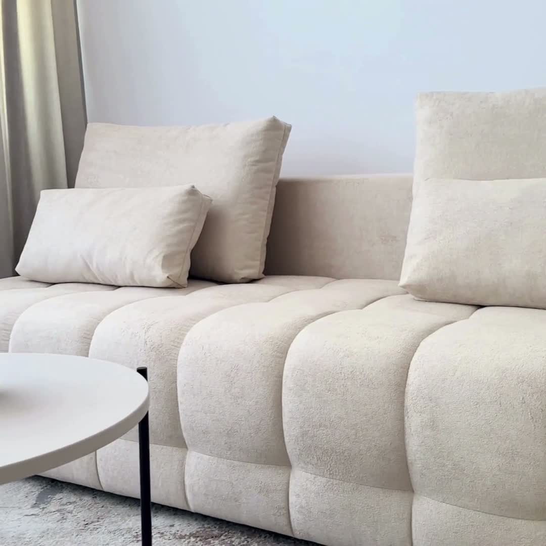 Rozkládací pohovka Tuko s úložným prostorem - šedá látka Freya 210-21 Pohovka Tuko rozkladana s úložným prostorem- šedá boucle Freya 210.21