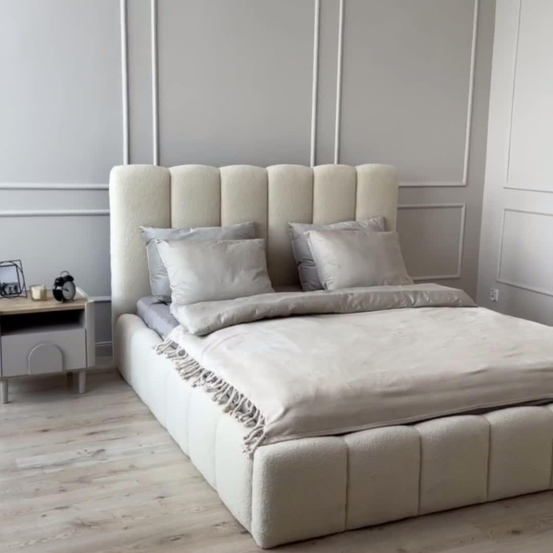 Čalouněná postel Aura 180x200 s úložným prostorem - šedá buklé Quelle 83 Postel čalouněné Aura 180x200 s úložným prostorem- šedá bukla Quelle 83 