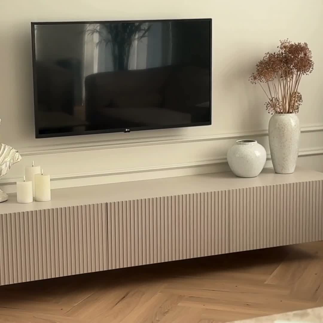 Závesná TV skrinka Nicole 200 cm so zásuvkou - čierny mat TV skrinka závesná Nicole z szuflada 200 cm - Čierny / Čierny mat