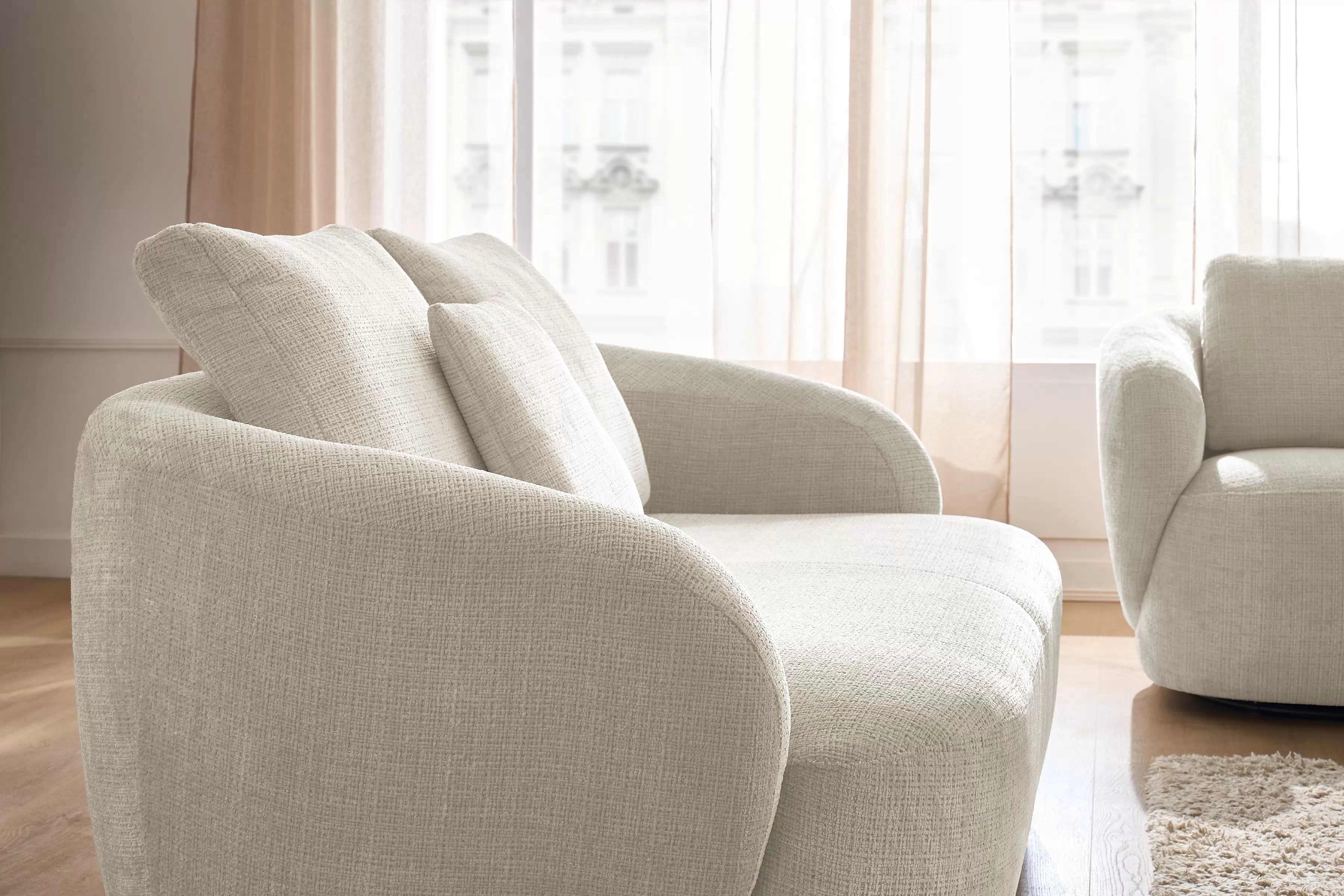 Čalouněný set Finezal - pohovka 2místná + otočné křeslo Komplet čalouněná Pohovka Finezal 2-os + Křeslo obrotowy